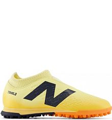 Turfy New Balance żółte dziecięce TEKELA V4+ MAGIQUE JNR FG SJT3TJ45